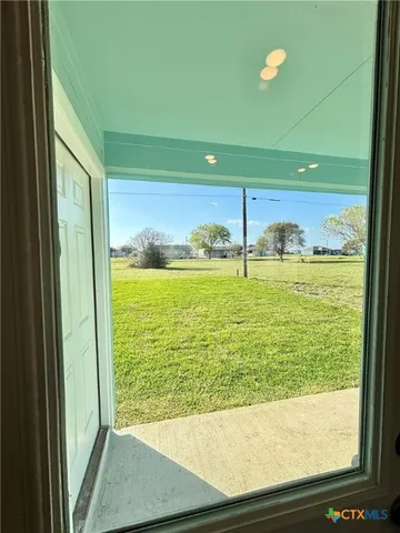 a view of a ocean from a window