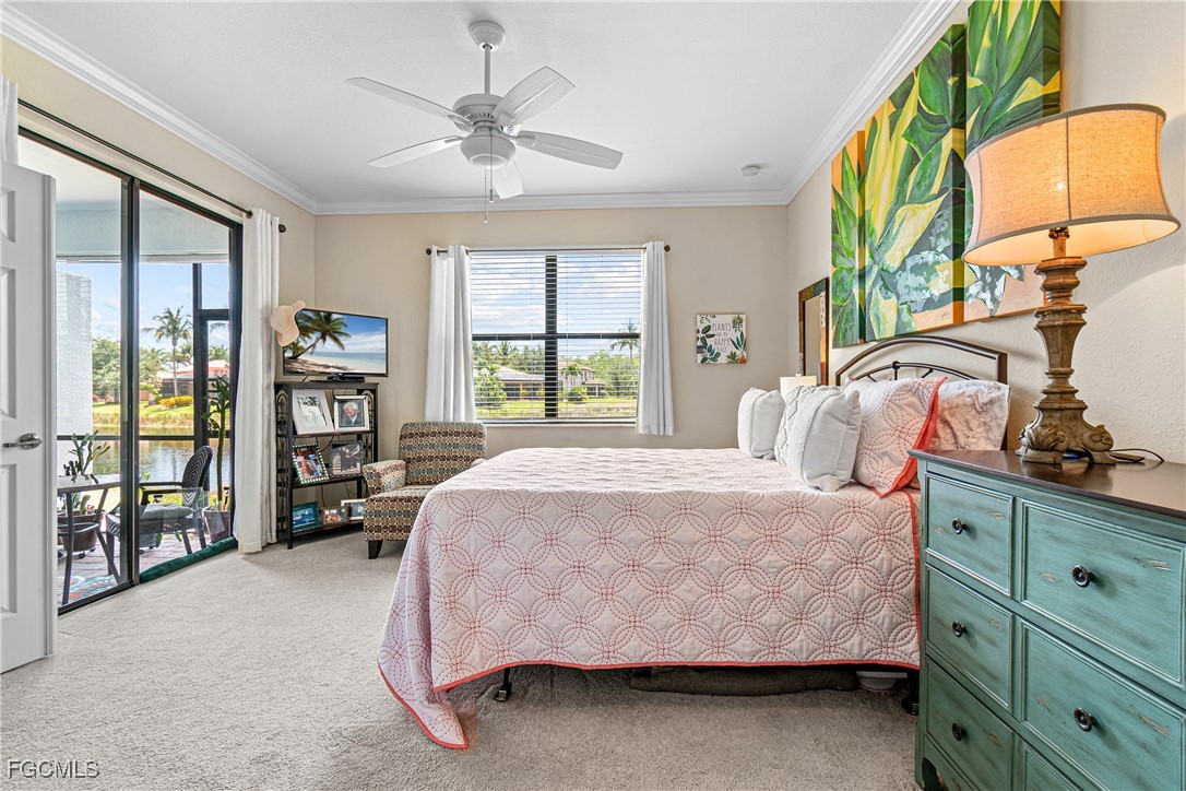 9138 Water Tupelo Road Fort Myers, FL 33912 - Photo 13 of 28 a bedroom with a bed and a dresser