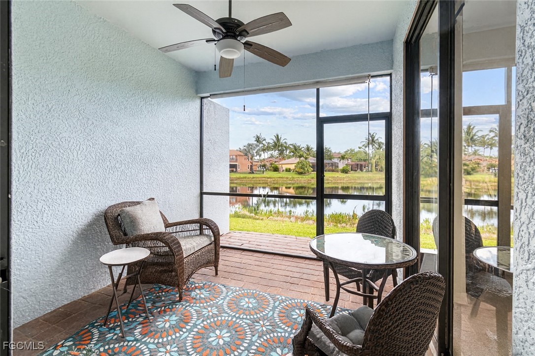 9138 Water Tupelo Road Fort Myers, FL 33912 - Photo 21 of 28 a living room with furniture and a window