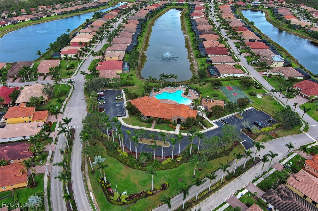 9138 Water Tupelo Road Fort Myers, FL 33912 - Photo 27 of 28 an aerial view of residential houses with outdoor space and swimming pool