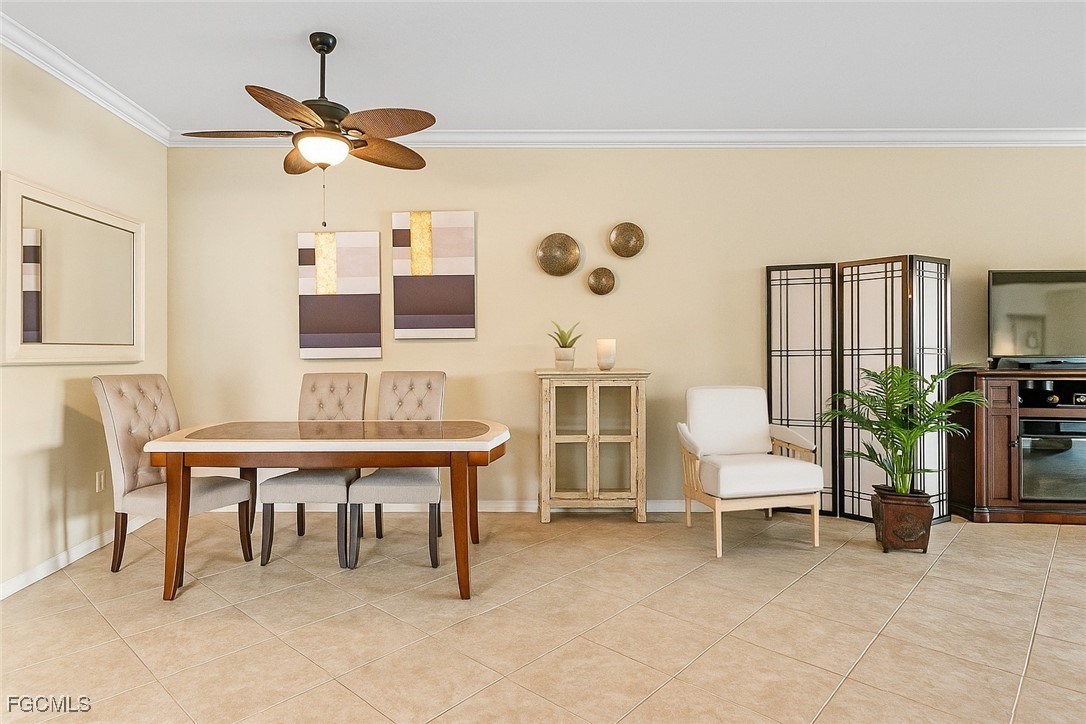9138 Water Tupelo Road Fort Myers, FL 33912 - Photo 6 of 28 a view of a livingroom with furniture and a work place
