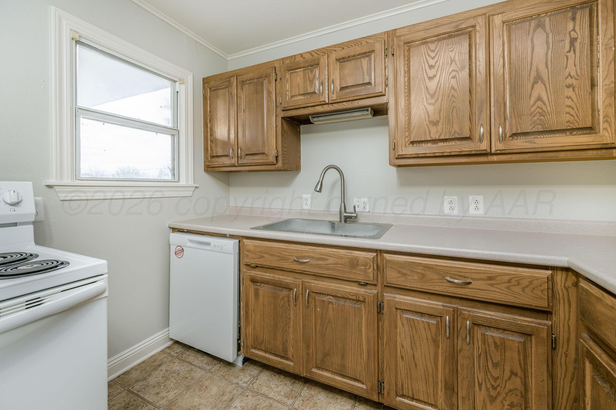 911 West 3rd Street Canyon, TX 79015 - Photo 7 of 18 Kitchen