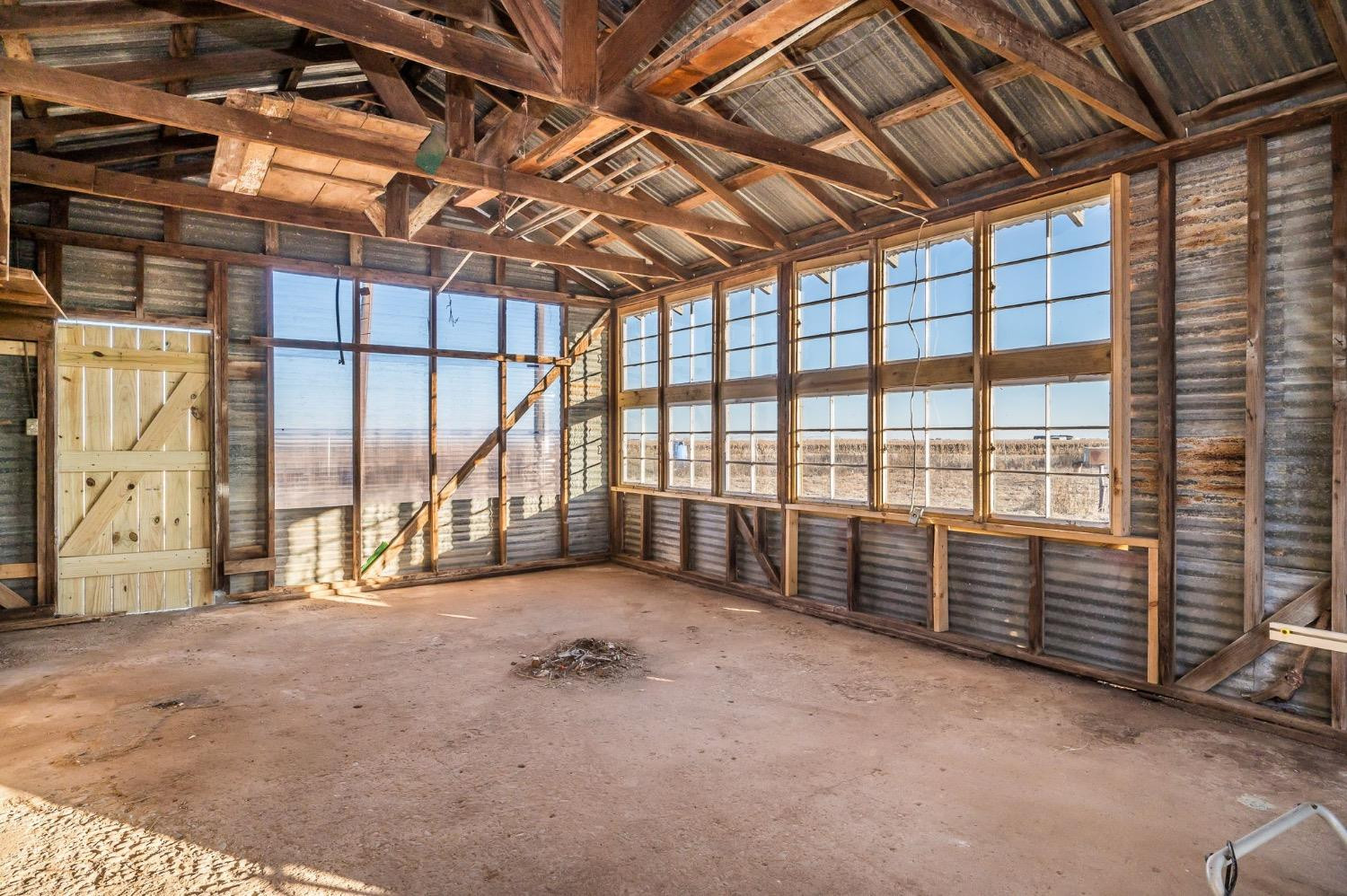 1401 County Road Z Plainview, TX 79072 - Photo 32 of 41 a view of an empty room with a balcony