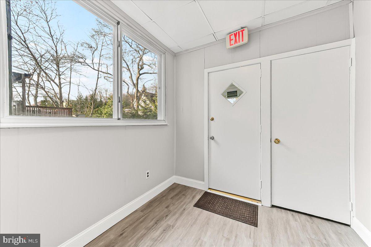 1024 East 18th Street Chester, PA 19013 - Photo 15 of 31 a view of a hallway with wooden floor and closet