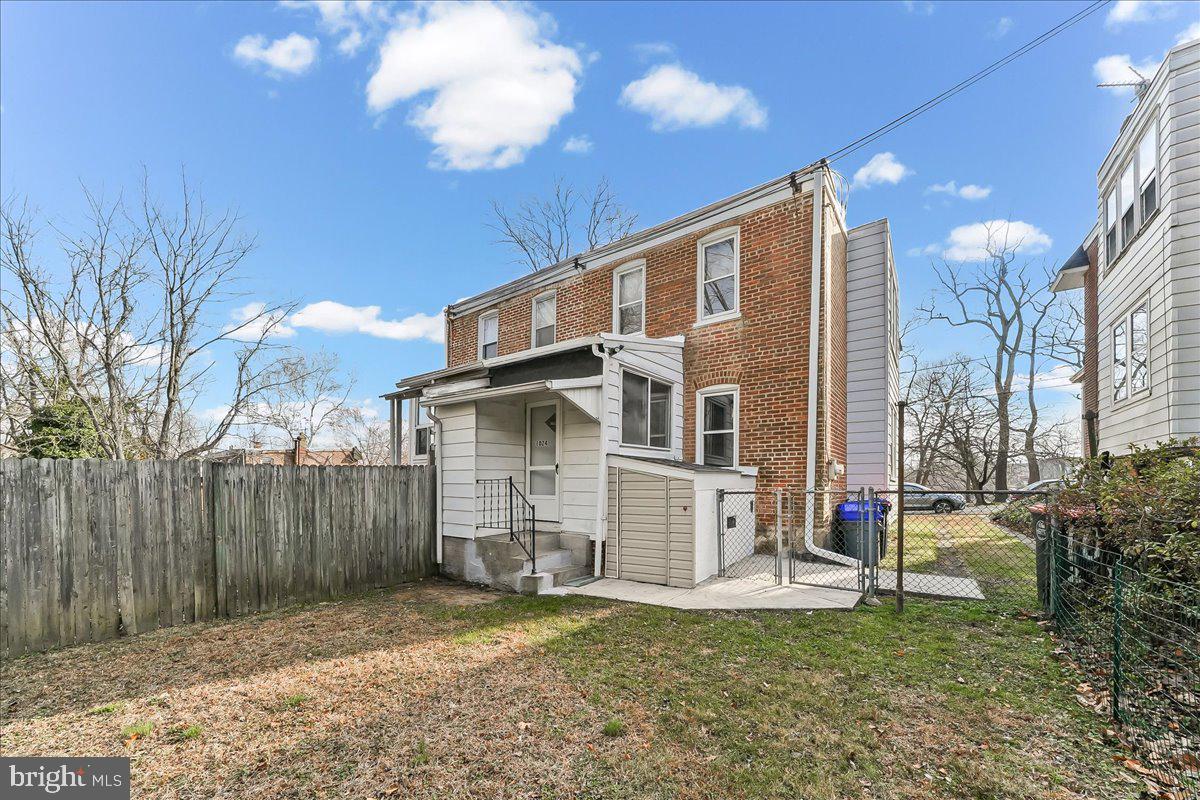 1024 East 18th Street Chester, PA 19013 - Photo 26 of 31 a view of a house with a yard