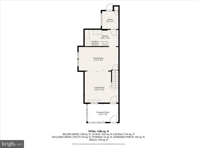 a picture of a bench in front of a wall