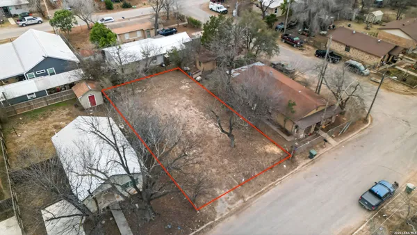 a view of a backyard of a house