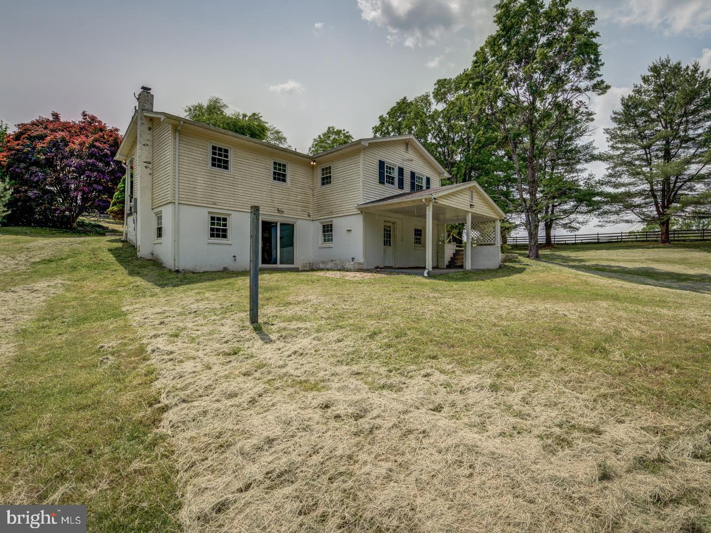 10166 Conde Road Marshall, VA 20115 - Photo 10 of 42 a front view of a house with a yard