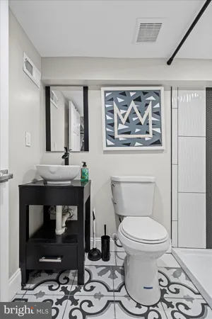 a room with furniture and a flat screen tv