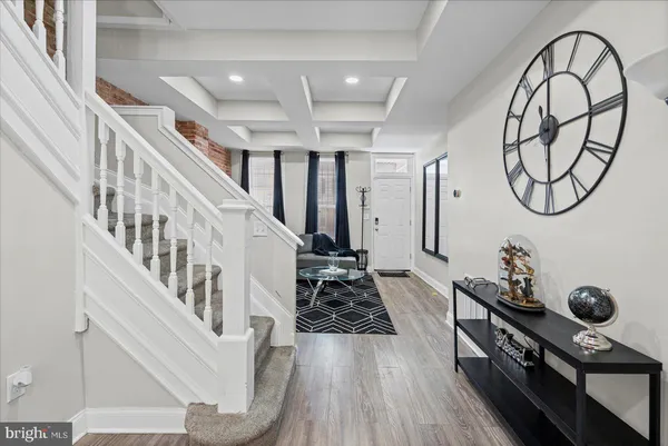 a view of entryway with a front door