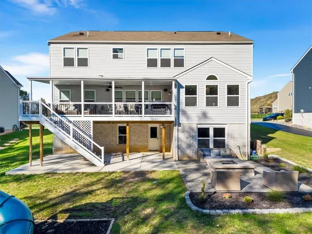 a view of a house with swimming pool