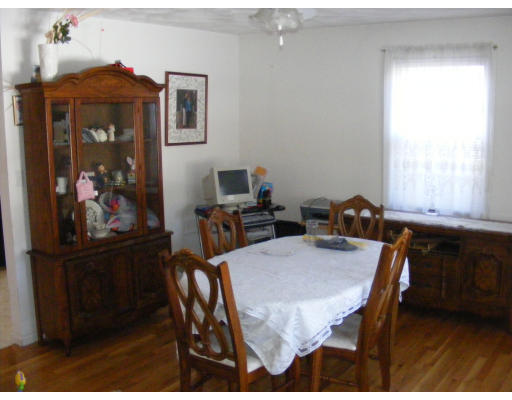 32 Evergreen Road Natick, MA 01760 - Photo 11 of 24 a view of a dining room with furniture and window
