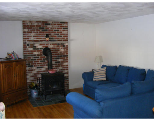 32 Evergreen Road Natick, MA 01760 - Photo 13 of 24 a view of livingroom with furniture and a fireplace