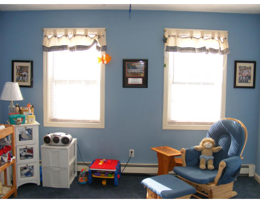 32 Evergreen Road Natick, MA 01760 - Photo 15 of 24 a living room with furniture and a window