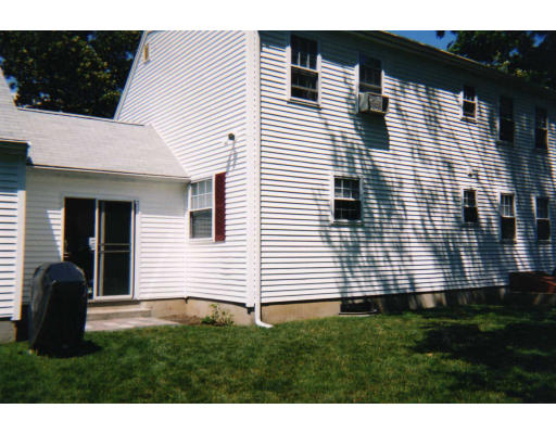 32 Evergreen Road Natick, MA 01760 - Photo 3 of 24 a view of a house with a backyard