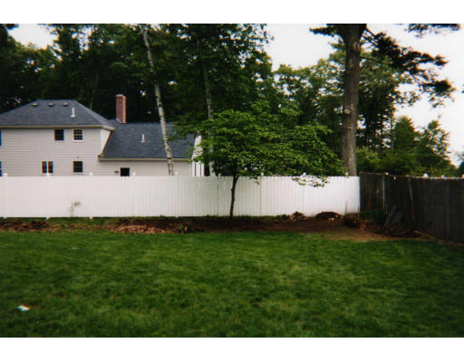 32 Evergreen Road Natick, MA 01760 - Photo 4 of 24 a front view of a house with a yard
