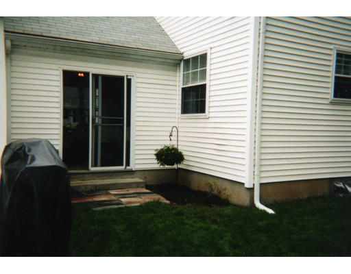32 Evergreen Road Natick, MA 01760 - Photo 6 of 24 a backyard of a house