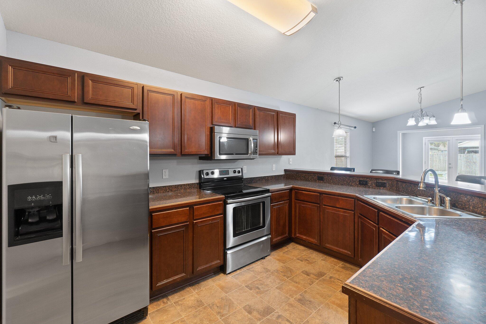 7984 Promise Creek Road Navarre, FL 32566 - Photo 9 of 22 Kitchen - 3