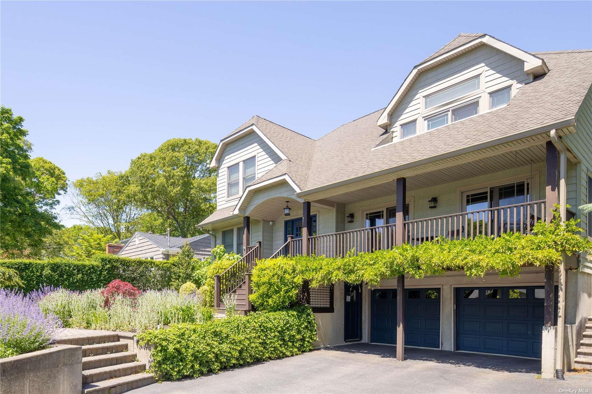 1600 Westview Drive Mattituck, NY 11952 - Photo 25 of 25 a front view of a house with garden