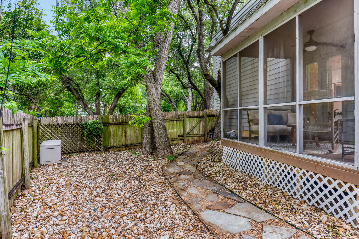 1912 Lightsey Road, Unit 6 Austin, TX 78704 - Photo 24 of 27 a view of a brick house with a large window
