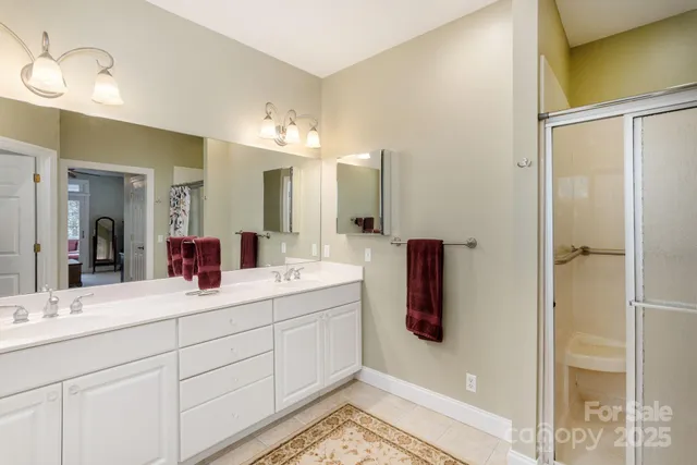 a front view of a house with a yard and balcony