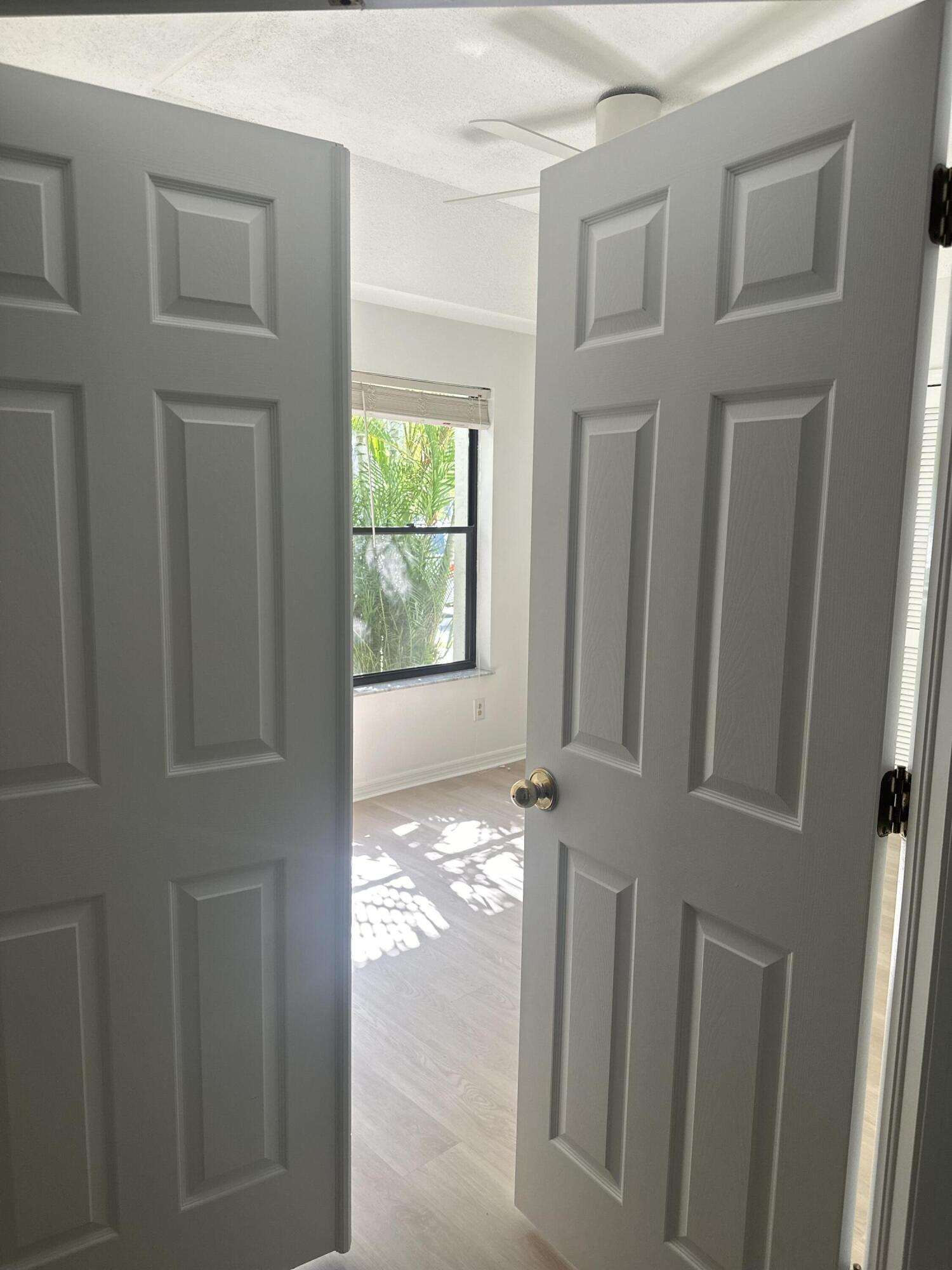 5270 Southeast Seascape Way, Unit 102 Stuart, FL 34997 - Photo 13 of 24 a view of an entryway door