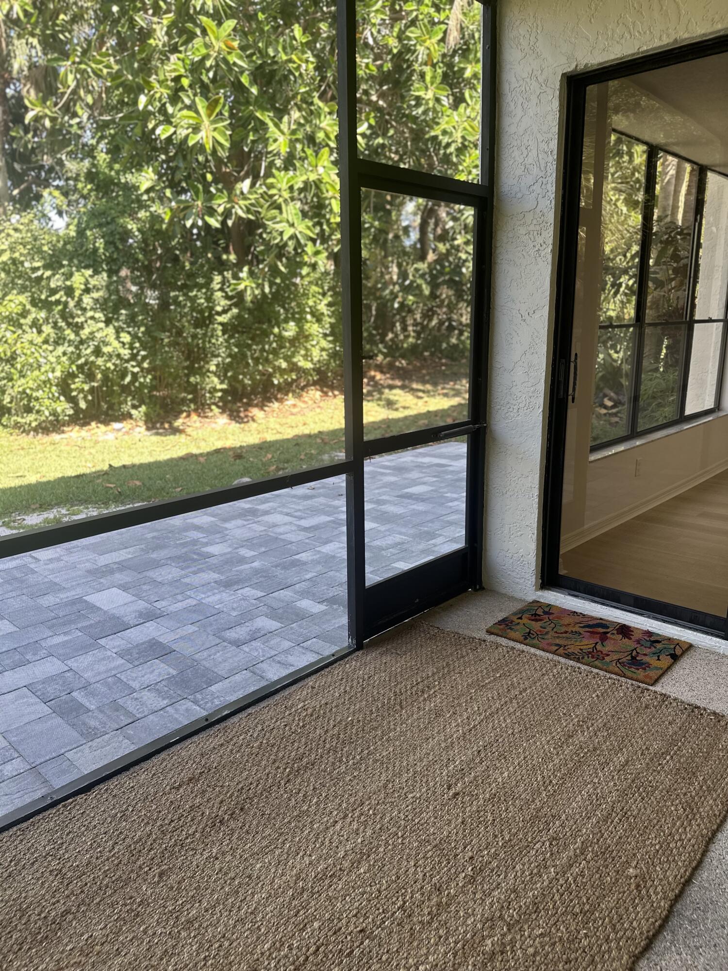 5270 Southeast Seascape Way, Unit 102 Stuart, FL 34997 - Photo 16 of 24 a view of an empty room and window