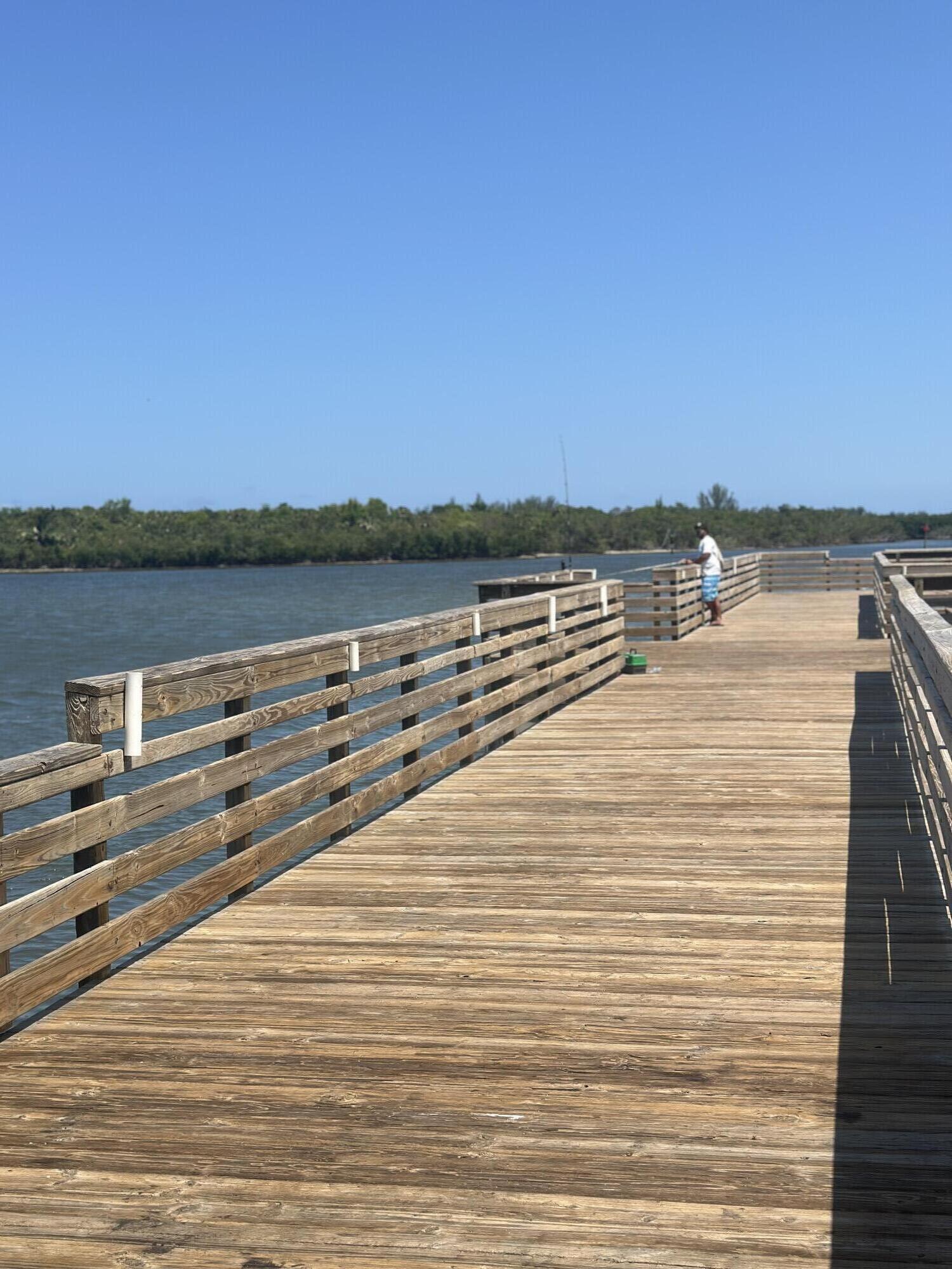 5270 Southeast Seascape Way, Unit 102 Stuart, FL 34997 - Photo 22 of 24 a view of lake