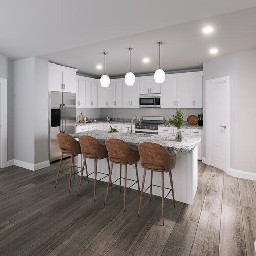 9194 Trident Road Milton, FL 32583 - Photo 13 of 45 a kitchen with kitchen island granite countertop stainless steel appliances a stove a sink a microwave a center island and a cabinets