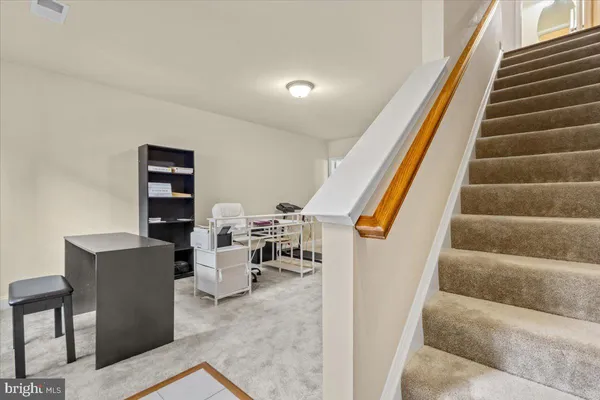 a view of entryway and workspace