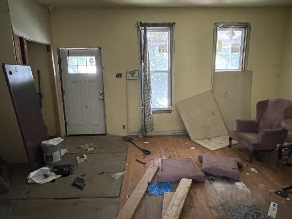 8447 South Escanaba Avenue Chicago, IL 60617 - Photo 5 of 8 a bathroom with a sink and a mirror