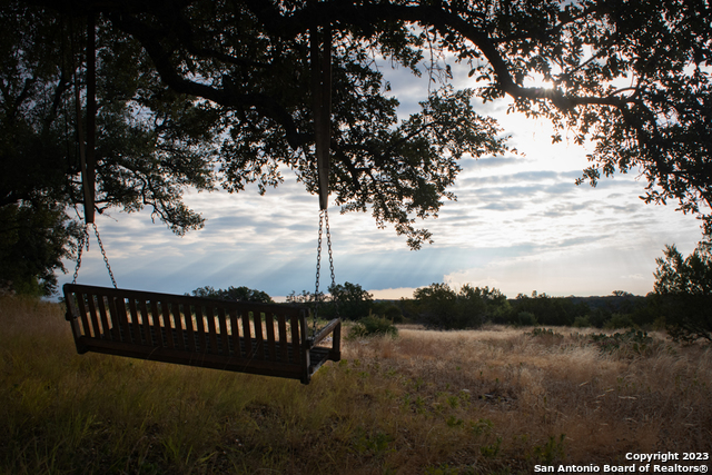 a view of a street next to a lake