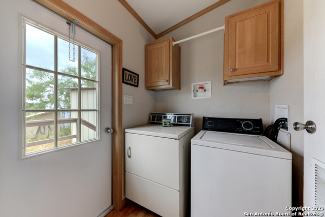 649 Rocky Hill Road Junction, TX 76849 - Photo 15 of 51 a utility room with dryer and washer