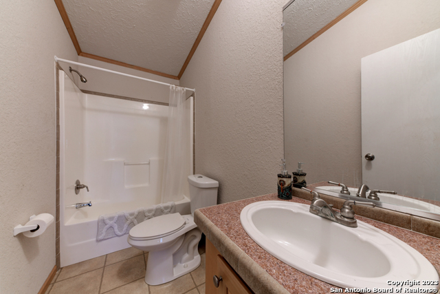 649 Rocky Hill Road Junction, TX 76849 - Photo 19 of 51 a bathroom with a sink toilet and shower