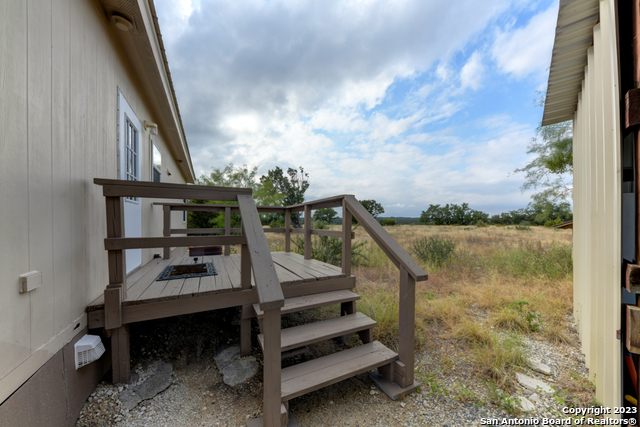 649 Rocky Hill Road Junction, TX 76849 - Photo 22 of 51 a view of entryway and workspace