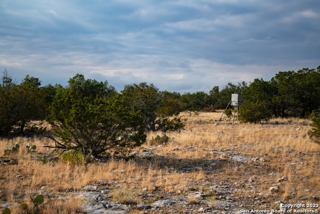 649 Rocky Hill Road Junction, TX 76849 - Photo 35 of 51 a view of a yard covered in snow