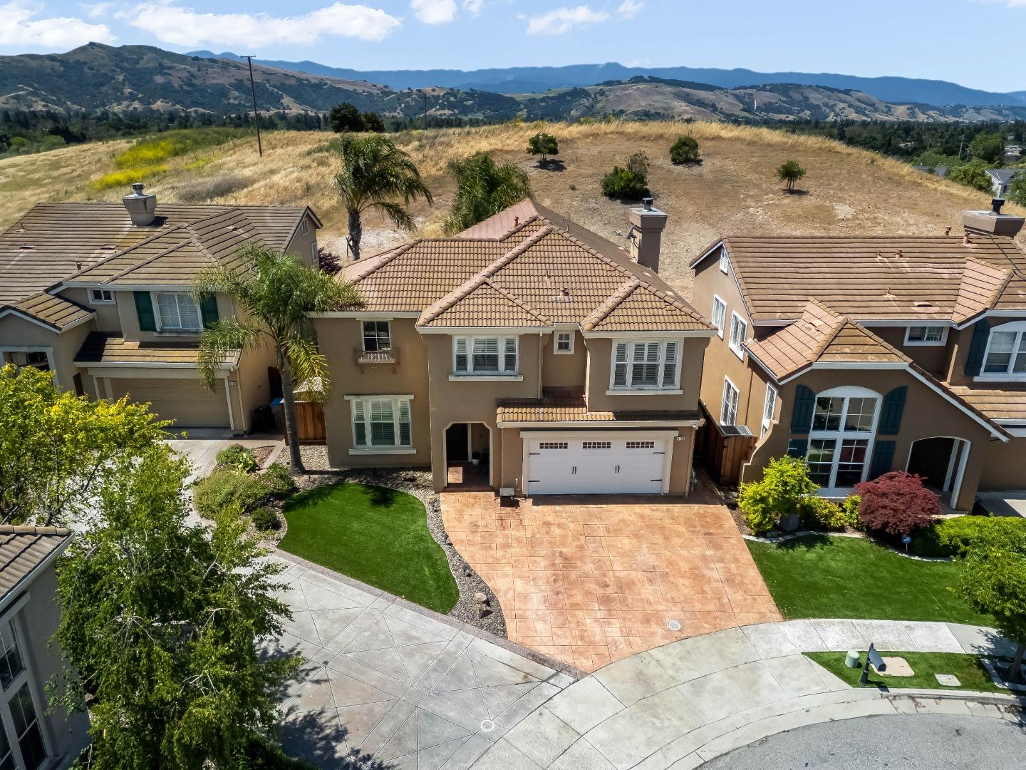 1170 Schoolhouse Road San Jose, CA 95138 - Photo 1 of 35 an aerial view of a house with a garden and lake view