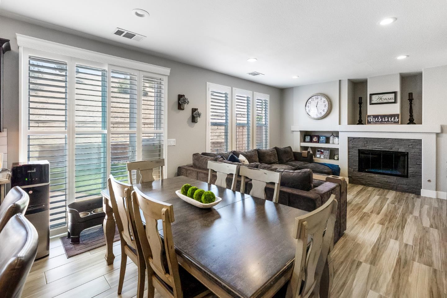1170 Schoolhouse Road San Jose, CA 95138 - Photo 12 of 35 a view of a dining room with furniture window and wooden floor