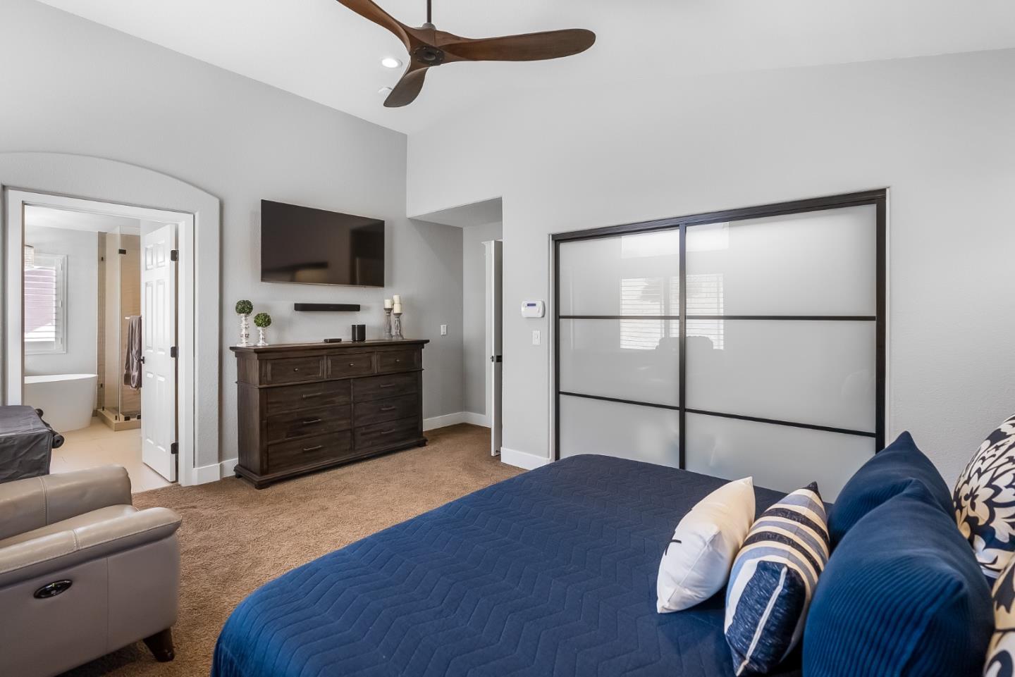 1170 Schoolhouse Road San Jose, CA 95138 - Photo 18 of 35 a bedroom with a bed and a television