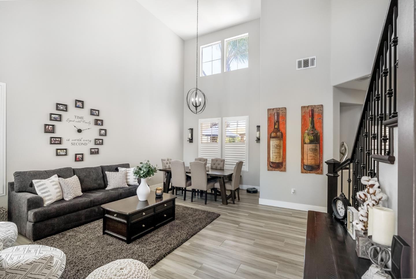 1170 Schoolhouse Road San Jose, CA 95138 - Photo 4 of 35 a living room with furniture and wooden floor