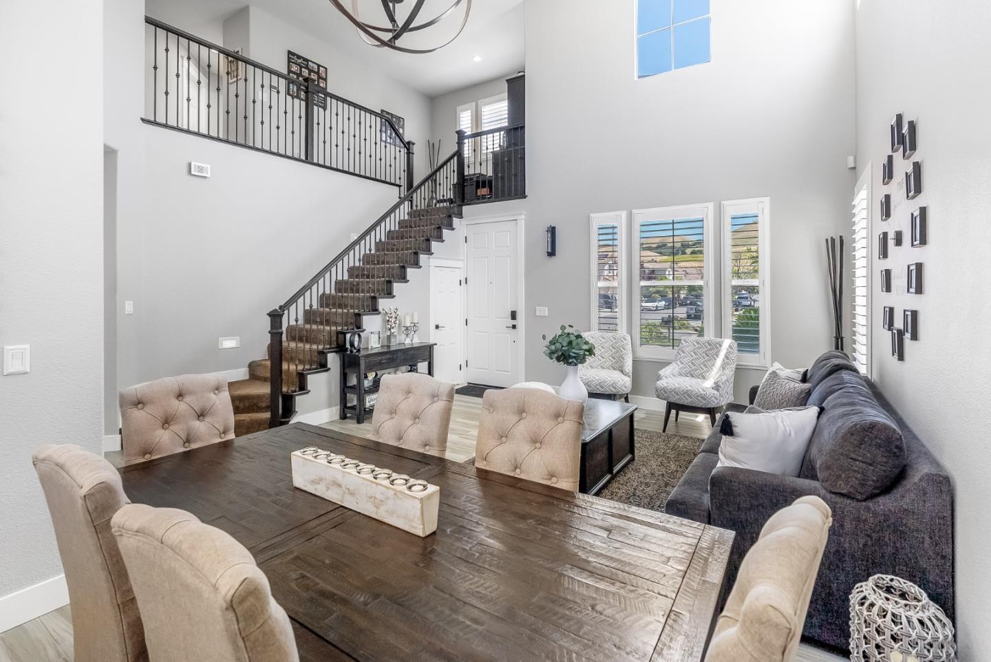 1170 Schoolhouse Road San Jose, CA 95138 - Photo 6 of 35 a living room with furniture and stairs