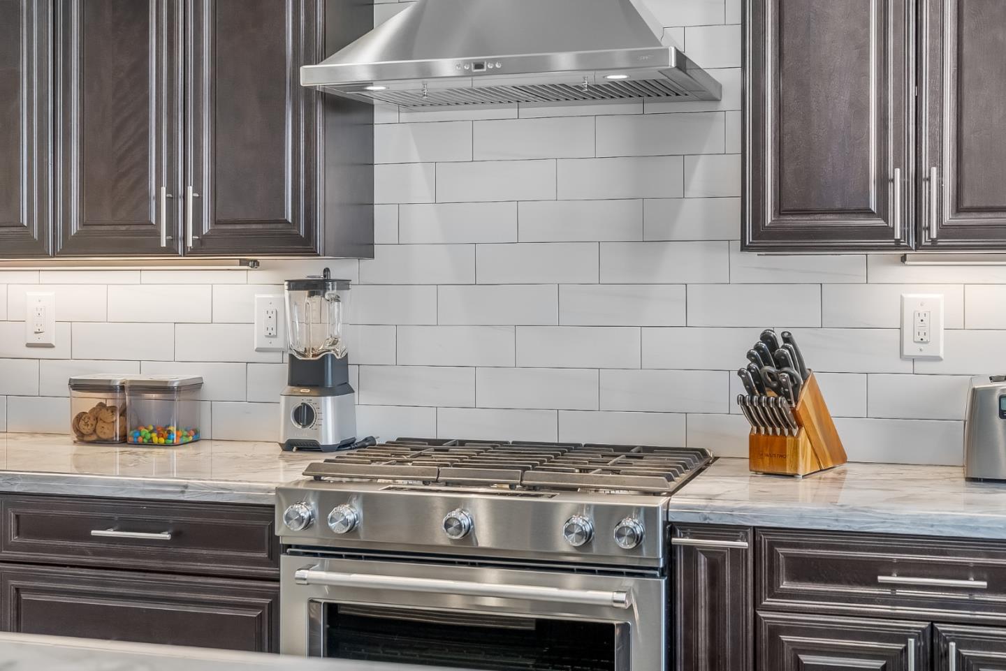 1170 Schoolhouse Road San Jose, CA 95138 - Photo 10 of 35 a stove top oven sitting inside of a kitchen