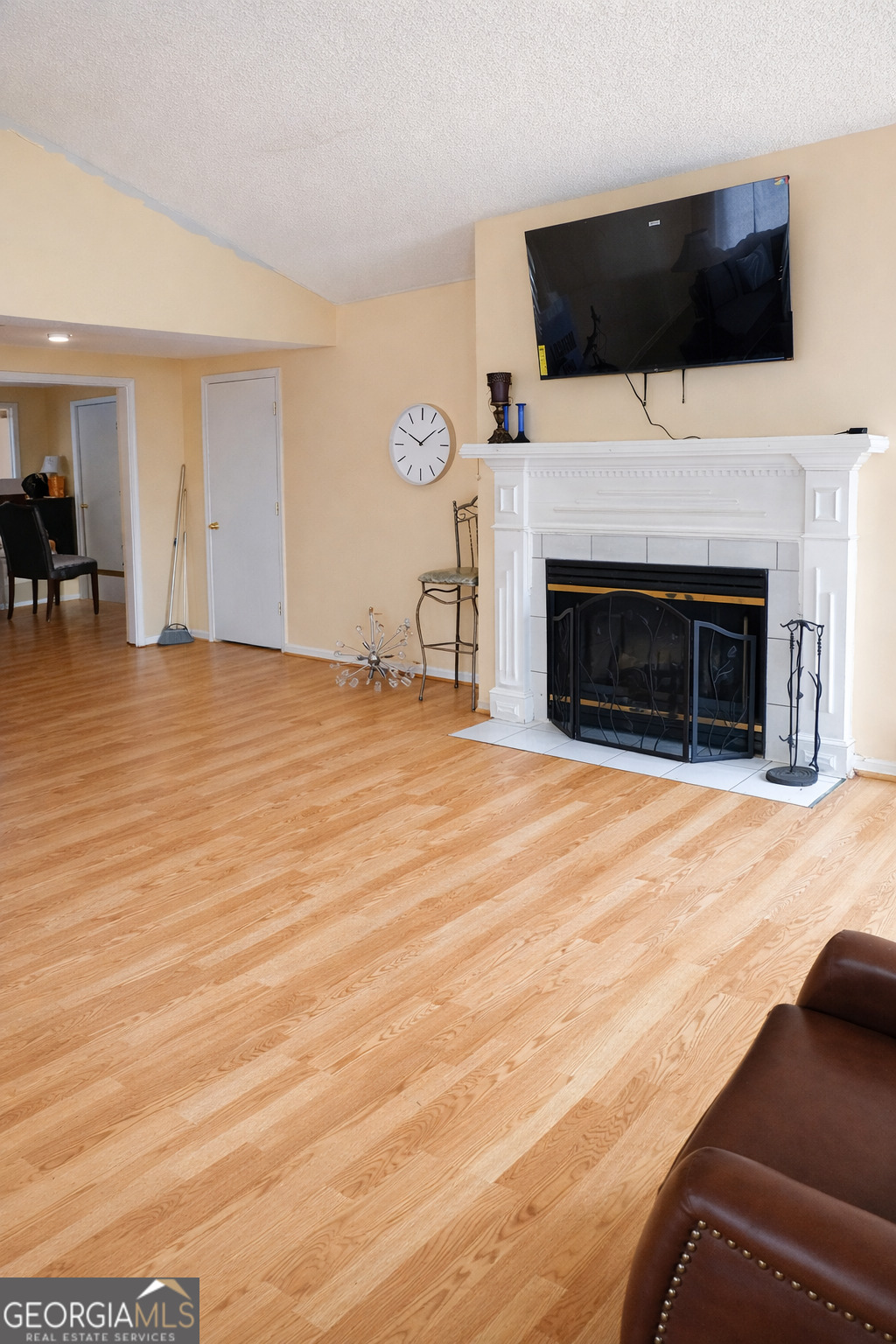1626 Pine Street Northeast Edison, GA 39846 - Photo 2 of 10 a view of empty room with fireplace and tv