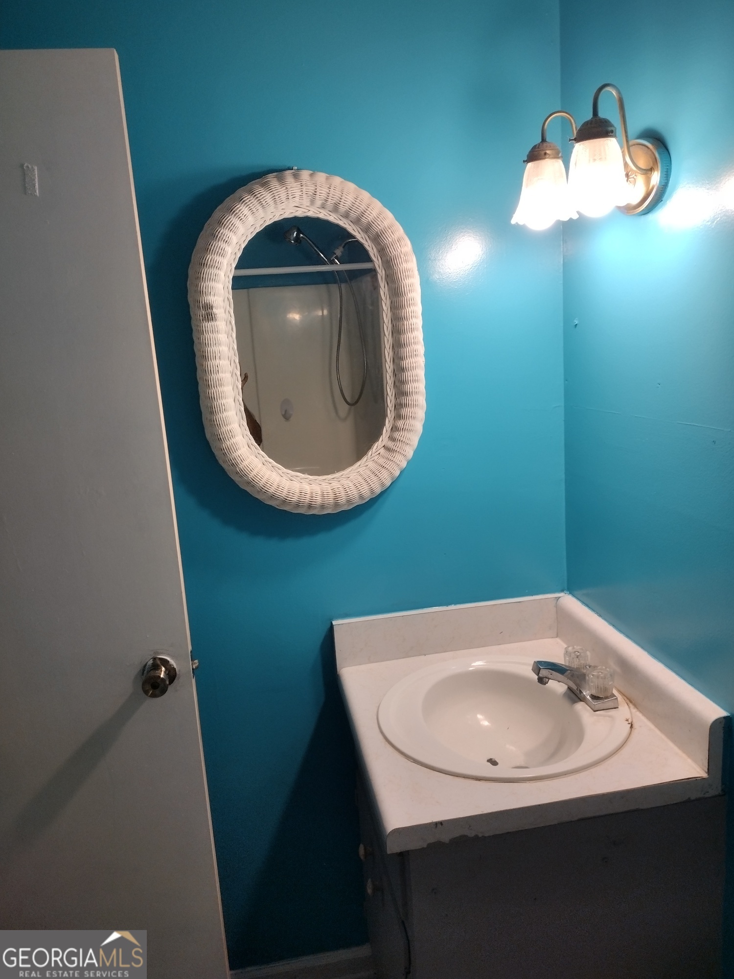 1626 Pine Street Northeast Edison, GA 39846 - Photo 5 of 10 a bathroom with a sink and mirror