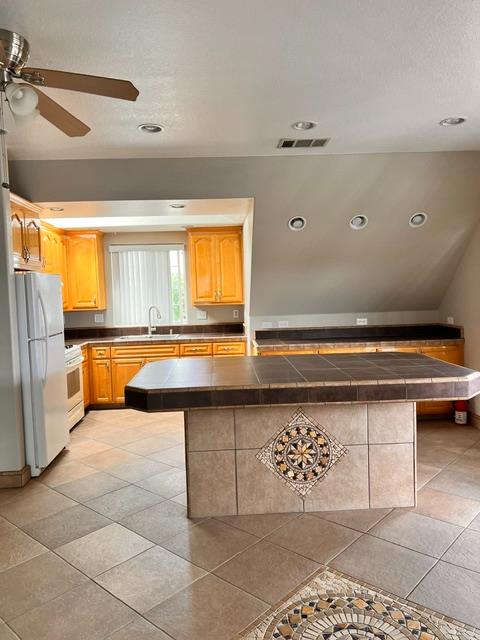 3019 Lathrop Road Manteca, CA 95336 - Photo 29 of 43 a view of a kitchen with a sink