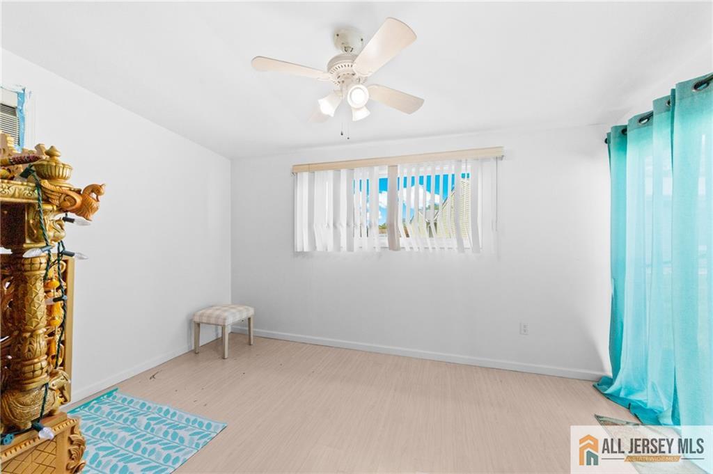 25C Pitman Road, Unit B Monroe Township, NJ 08831 - Photo 14 of 29 a view of an empty room with a window