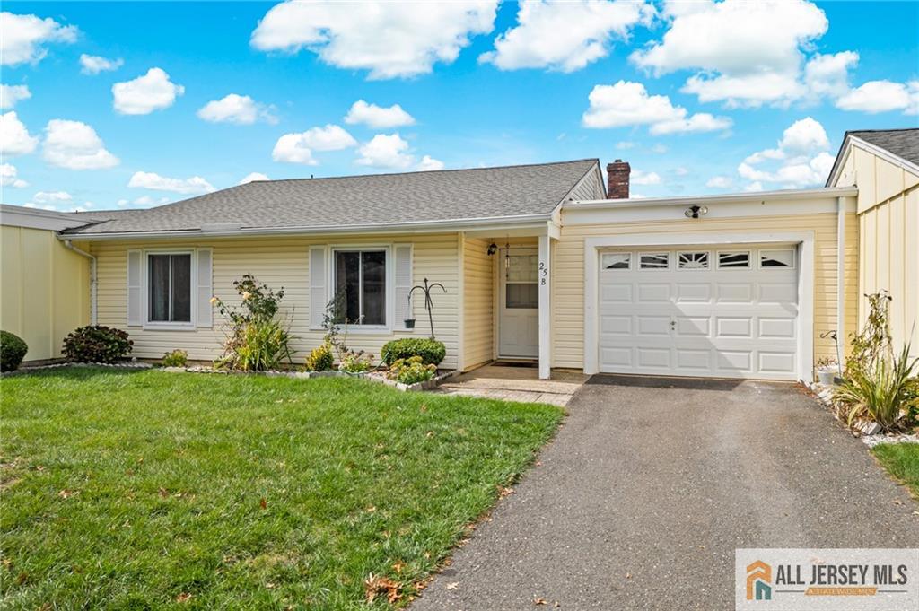 25C Pitman Road, Unit B Monroe Township, NJ 08831 - Photo 2 of 29 a front view of a house with garden