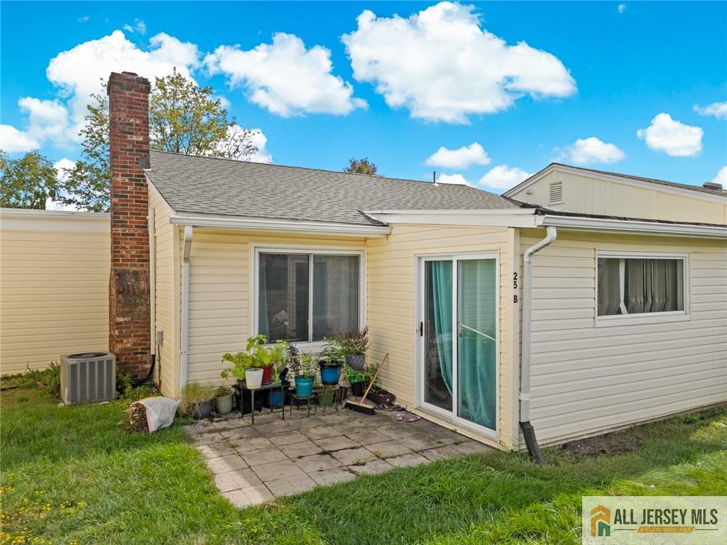 25C Pitman Road, Unit B Monroe Township, NJ 08831 - Photo 24 of 29 a view of a house with backyard