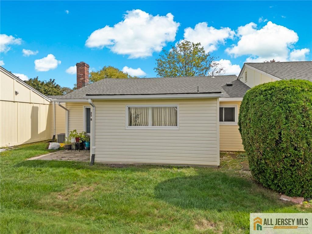 25C Pitman Road, Unit B Monroe Township, NJ 08831 - Photo 25 of 29 a front view of a house with a garden