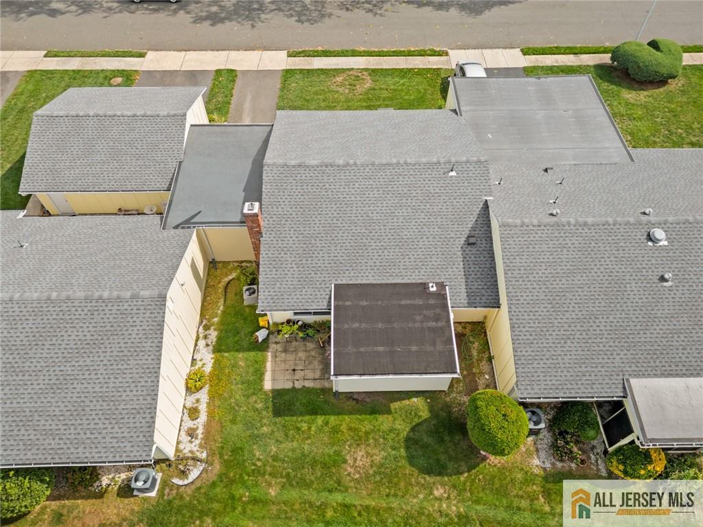 25C Pitman Road, Unit B Monroe Township, NJ 08831 - Photo 26 of 29 swimming pool with outdoor seating and yard